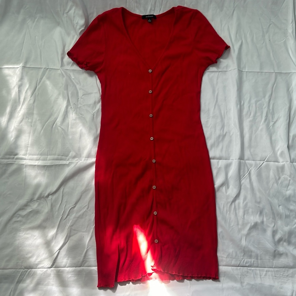 A red knee-length dress